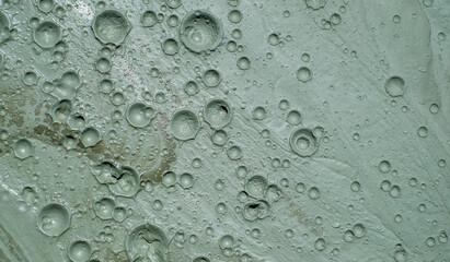 Small craters in mud volcanoes's clay river. Buzau county, Romania.