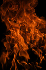 Flame fires. Burn lights on a black background. Fire flames on black background. Abstract fire...