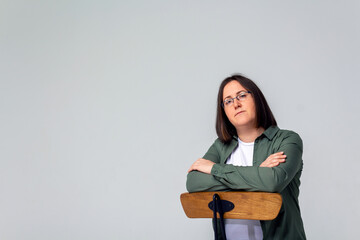 Fototapeta premium Small business owner woman on grey background. 
