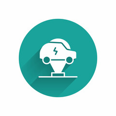 White Electric car and electrical cable plug charging icon isolated with long shadow background. Renewable eco technologies. Green circle button. Vector