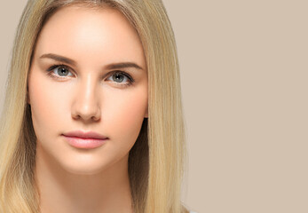 Long smooth hair beauty woman close up portrait blonde hairstyle. Color background brown