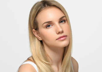 Fototapeta premium Long smooth hair beauty woman close up portrait blonde hairstyle. On white background