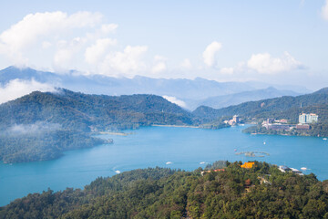 Fototapeta premium Asia culture - Beautiful landscape of lake level reflect fantasy dramatic sunrise sky in Sun Moon Lake , in Taiwan, Asia. the famous travel attractions in Nantou ,Taiwan. Scenery of Sun Moon Lake,