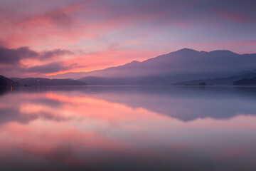 Asia culture - Beautiful landscape of lake level reflect fantasy dramatic sunrise sky in Sun Moon Lake , in Taiwan, Asia. the famous travel attractions in Nantou ,Taiwan. Scenery of Sun Moon Lake, 