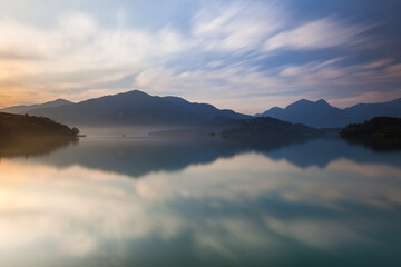 Asia culture - Beautiful landscape of lake level reflect fantasy dramatic sunrise sky in Sun Moon Lake , in Taiwan, Asia. the famous travel attractions in Nantou ,Taiwan. Scenery of Sun Moon Lake, 