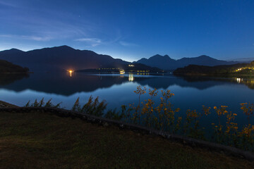 Asia culture - Beautiful landscape of lake level reflect fantasy dramatic sunrise sky in Sun Moon Lake , in Taiwan, Asia. the famous travel attractions in Nantou ,Taiwan. Scenery of Sun Moon Lake, 
