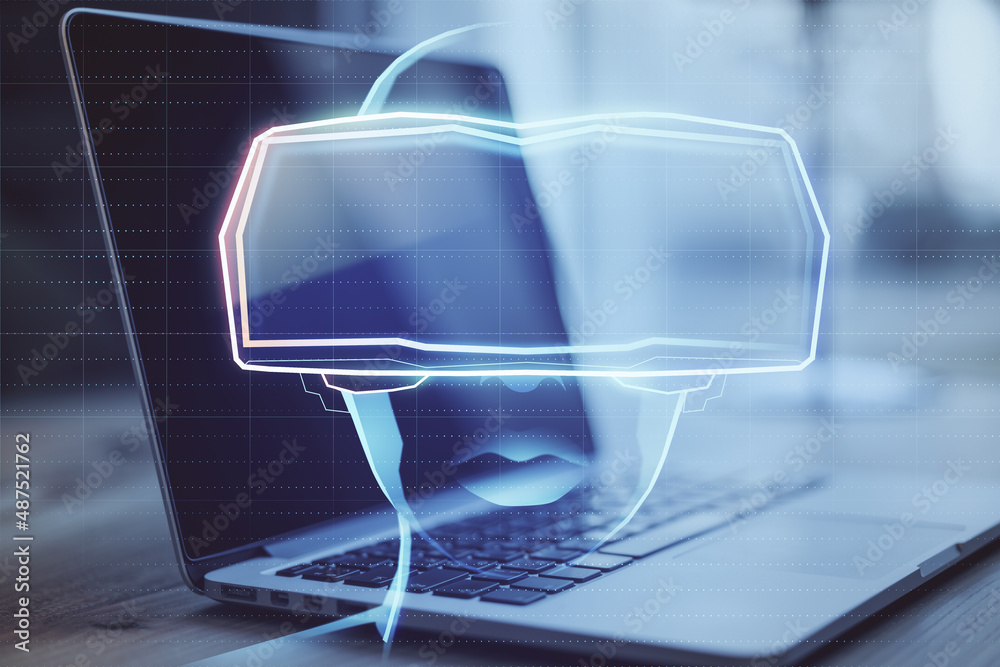 Poster close up of laptop computer with abstract hologram of digital head with vr glasses on blurry backgro