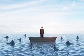 Tuinposter Thoughtful young businessperson on boat standing and looking at surrounding sharks. Mock up place on bright sky with clouds background. Boss and risk concept. © Who is Danny