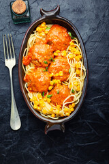 Vegan meatballs or falafel and pasta.