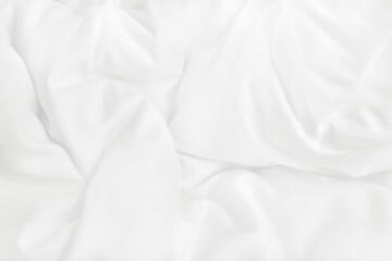 Obraz premium Texture of white blanket and bedding sheet with crumpled or messy in bedroom after wake up.