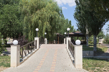 Pedestrian bridge in the garden named after Karaev in the city of Evpatoria, Crimea