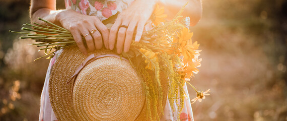 girl in the field at sunset
