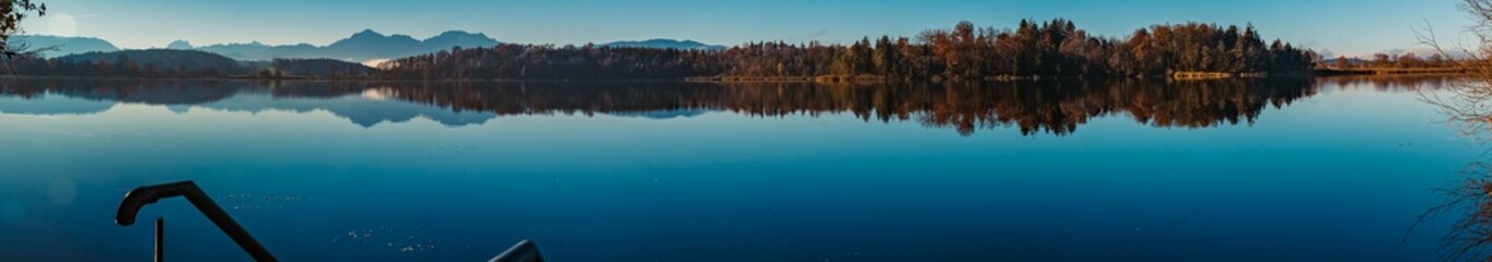 High resolution stitched panorama with reflections at the famous Abtsee lake, Saaldorf, Bavaria, Germany