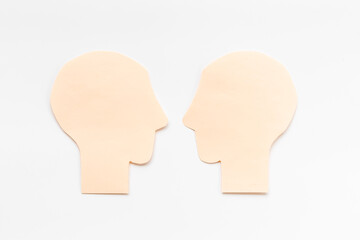 Two shape of men head - connection and communication concept