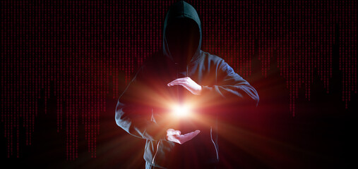 Hacker security cyber attack. Hacker man hand isolated on black. Blurred internet web hack...