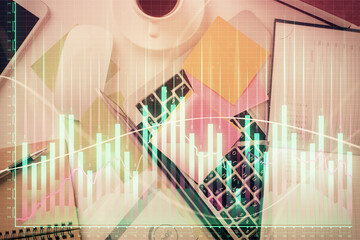 Multi exposure of financial chart drawing over table background with computer. Concept of research...