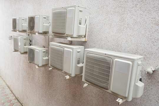 Air conditioner machines on old wall. Air condition system outdoor unit