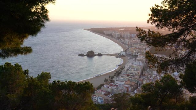 Blanes city on the Costa Brava of Spain, tourist beach town sunset and night images views from the air main beach