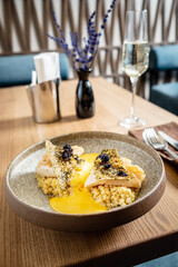 white fish with rice and sauce