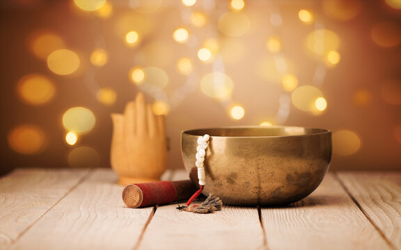 Singing bowl and sandalwood rosary. Buddhism and meditation concept