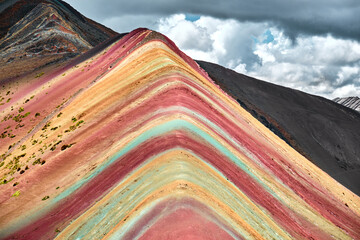 Rainbow Mountain or Vinicunca is a mountain in the Andes of Peru. - 487538378