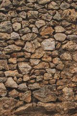 Old mediterranean style stone wall of the house