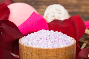 pink bomb and relaxing bath salt lie on rose petals