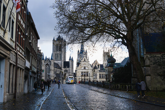 Panorama of Ghent with the tram in the background, on a cloudy and rainy day