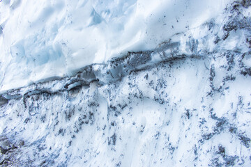 Ice wall close up. Melting glacier in Germany, macro. Global warming concept. Frozen water,...