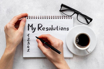 New year beginning solution goals concept - hand writing text, top view