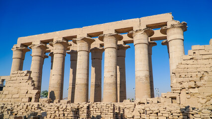 Obraz premium Luxor Temple in Luxor, ancient Thebes, Egypt. Luxor Temple is a large Ancient Egyptian temple complex located on the east bank of the Nile River and was constructed approximately 1400 BCE.