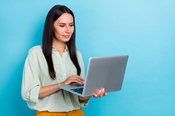 Profile side photo of young lady use laptop type project manager economist isolated over blue color background