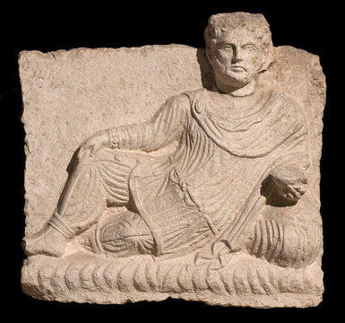 Resting man - ancient relief of Grave funerary Stele from Aydin, Turkey. Roman period, 200-273 AD