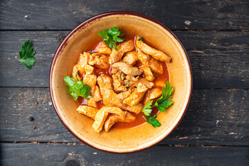 braised chicken meat tomato sauce chicken breast stew beef stroganoff second course healthy food fresh portion healthy meal food diet snack on the table copy space food background rustic top view