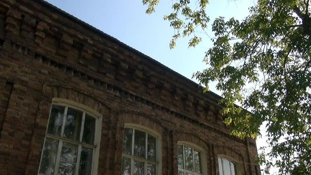 Alapaevsk, Russia - 17 July 2012: Windows of museum of Remembrance of Representatives of Russian Imperial House. Building, which contained relatives of Nicholas II before their execution.