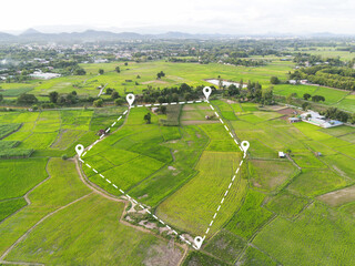 Land plot in aerial view, Top view land green field agriculture plant with pins, pin location icon for housing subdivision residential development owned sale rent buy or investment countryside suburbs - 487560514