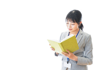 Naklejka premium 読書をする若いビジネスパーソン