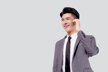 Young asian business man in suit talking on mobile phone isolated on white background, businessman speaking and listening smartphone with conversation, male holding cell phone, communication concept.