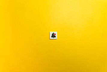 Alert, Notification, or Message Icon on Letter Tile on Yellow Background. Minimal Aesthetics.