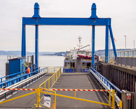 Awaiting the arival of the Waverley Paddleboat steamer at Dunoon, Scotland, UK