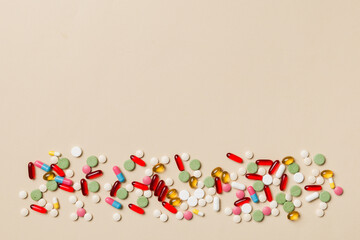 Protective face masks or surgical masks, medicine pills and thermometer on table background. Coronavirus disease. Corona virus concept. Space for text