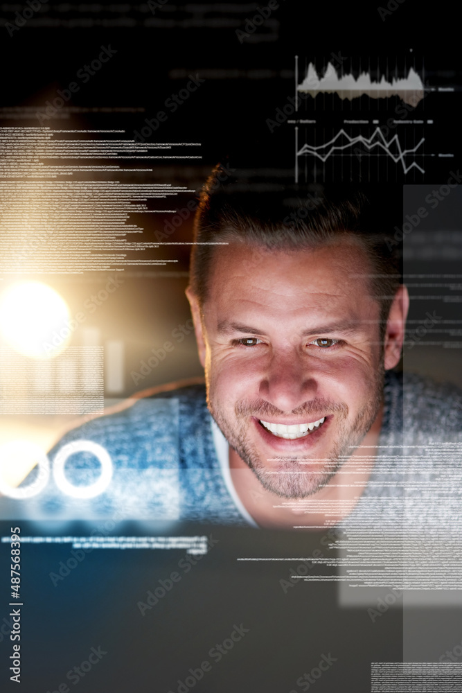 Poster Metadata is his playground. Shot of a smiling computer programmer working at his computer late at night.