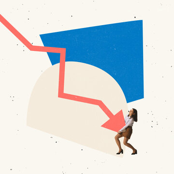 Young office worker, employee trying to prevent falling graph arrow symbolizing financial problems and business failure