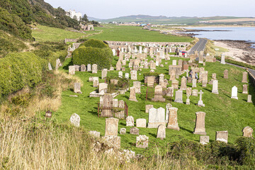 The roofless, ivy-covered chapel of St Columba in Keil Cemetery near Southend on the Kintyre Peninsula, Argyll & Bute, Scotland UK