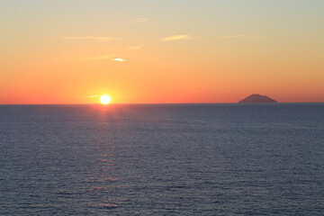 Sunset over the Mediterranean sea with clear sky. Sun over the water
