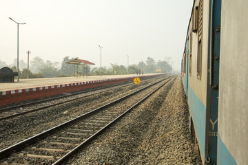 A Indian Railway line near a small station.