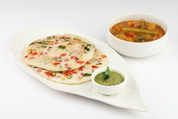 Uthappam or uttapam is a type of dosa from South India which is thicker, with tomato, onion and chilli toppings