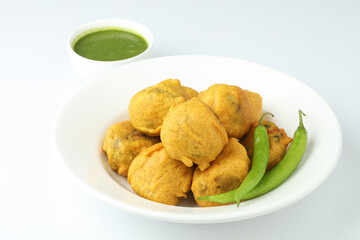 Indian snack aloo vada or bonda made from potato with coconut chutney. Indian snacks Aloo Bonda...