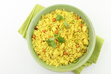 indian breakfast dish poha Aloo/Kanda Poha or Tarri Pohe with spicy chana masala/curry