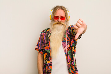 cool senior man feeling cross,showing thumbs down © kues1